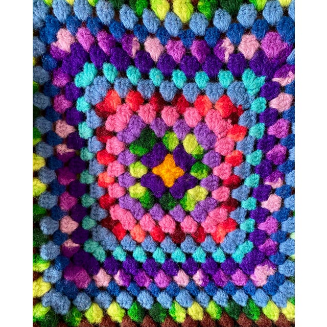 This charming vintage hand-crocheted bedspread is in excellent condition. Crafted from dense (likely wool) yarn in an...