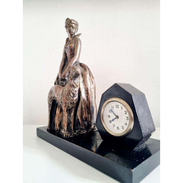 Table Clock with Copper Plated Lady with Greyhound Sculpture from Enrico Lazzar, Italy, 1910s, in Very Good conditions....