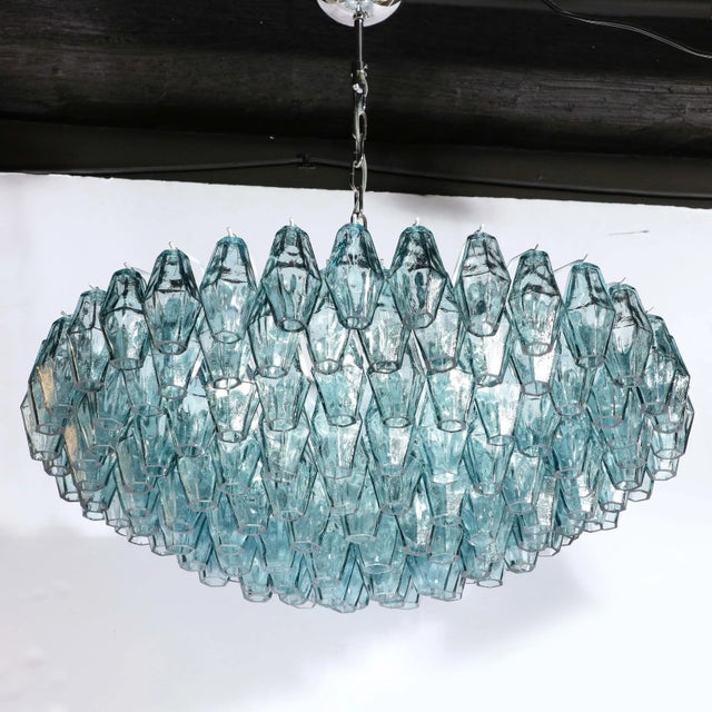 This beautiful Murano glass chandelier, in the manner of Venini, was hand blown in Murano, Italy- the island off the coast...