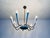This dynamic ceiling lamp, hailing from Italy in the 1950s, combines sporty flair with elegant mid-century design. The...