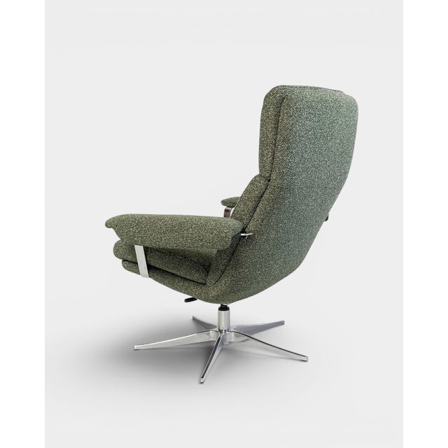 Modern lounge chair by MOOD Copenhagen, combining Scandinavian design with a high level of comfort. Upholstered in a...