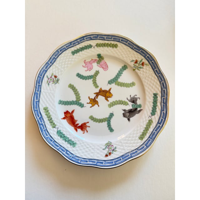 These are beautiful plates with a lovely scalloped edge. A wonderful example of chinoiserie design. Herend porcelain is...