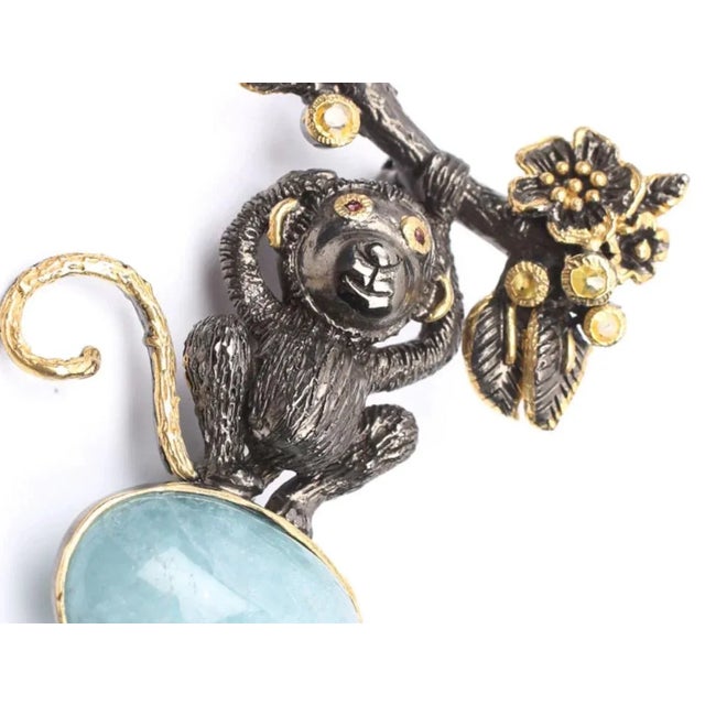 Metal Mid 20th Century Sterling Gold Plate 22.82 Ct. Aquamarine, Sapphire & Garnet Monkey Brooch For Sale - Image 7 of 7