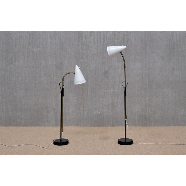 This rare pair of floor lamps was produced by Falkenbergs Belysning in Sweden in the 1960s. The lamps are marked with the...
