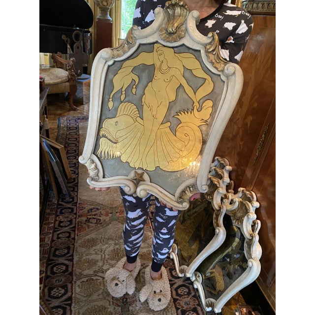 This is one in a spectacular suite of six rare Maison Jansen exquisitely stylized wall mirrors of the most versatile...