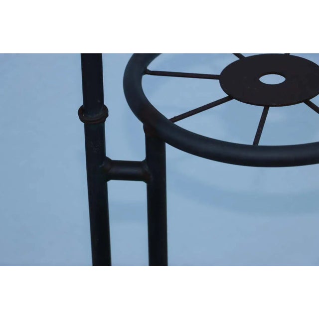 1960's 3 tier French metal plant stand, in vintage original condition with some wear and patina due to age and use.