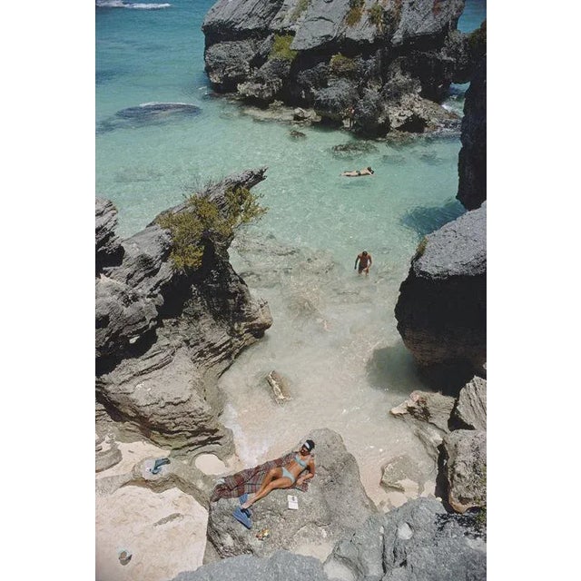 On The Beach In Bermuda 1967 Sunbathing and swimming at a beach in Bermuda, June 1967. Slim Aarons Slim Aarons was one of...