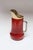 Aldo Tura Italian walnut pitcher wrapped in lacquered dyed-red goatskin with brass spout and handle (ca. 1950s, Italy)....