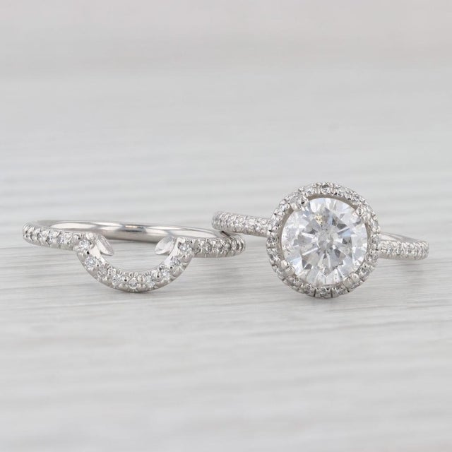 This ring comes with an EGL USA certificate for the center diamond. Gemstone Information: Natural Diamonds - 2.20 Total...