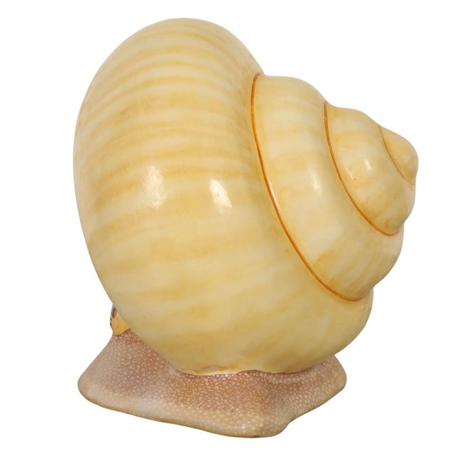 Large Sergio Bustamante paper mache Snail Sculpture. Signed and Numbered, #20 from a small edition of 100. Pretty cream...
