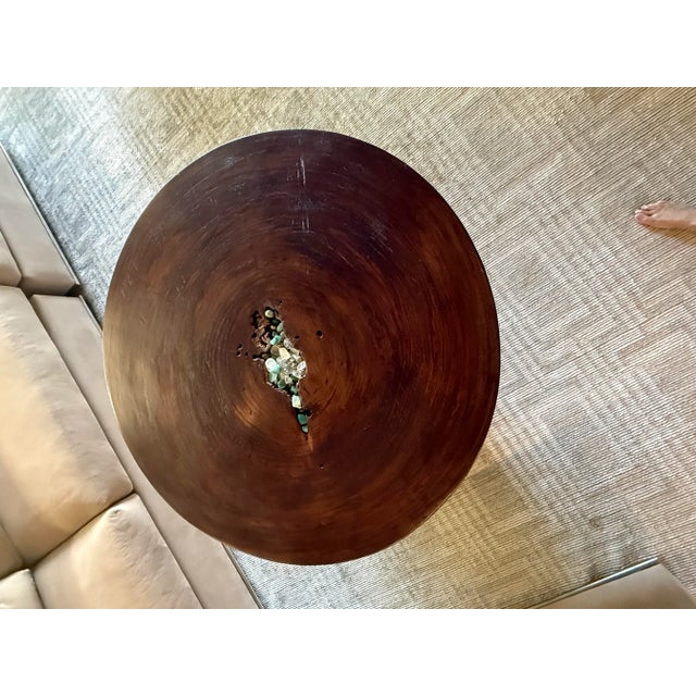 One of a kind hand made for me by a woodworker in San Diego. Solid piece of tree trunk. Beautiful functional art piece....