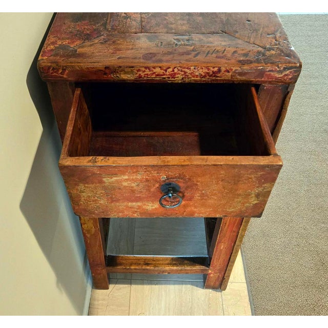 A unique piece and incredible example of a timeless Chinese design. This is a handmade piece with beautiful natural aging...