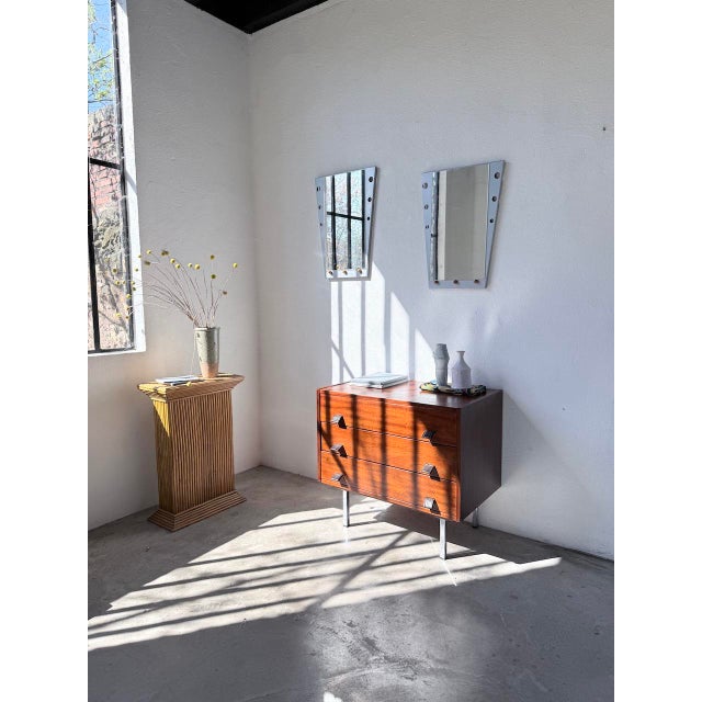 Antique leather chest of drawers, reminiscent of andré monpoix designs. made of teak and teak veneer, it features three...