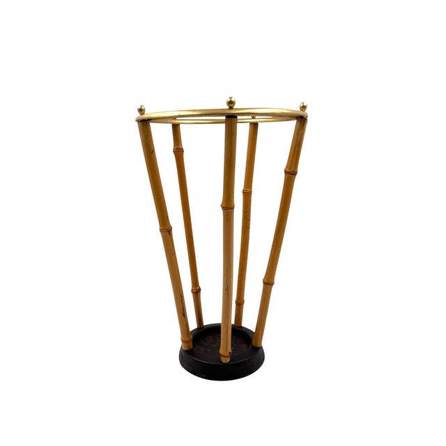 Hollywood regency bamboo umbrella rack France, 1970 Bamboo & brass H 39 cm x 24 cm diam. Conditions: excellent consistent...