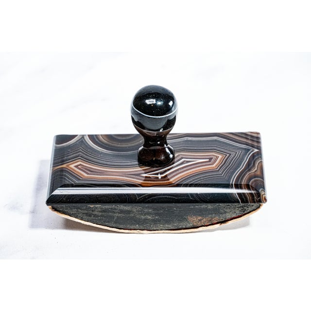 This elegant Victorian-era polished agate stone ink blotter, dating to the 1880s, is a striking example of both function...
