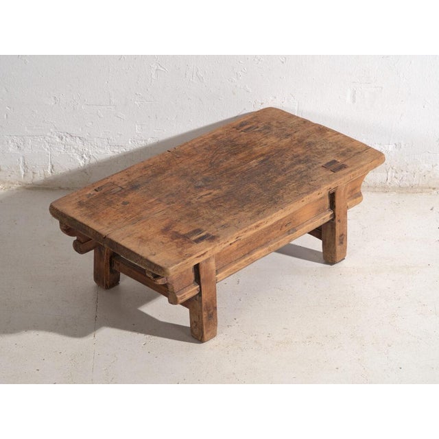 Antique low table in elm wood, traditional chinese furniture originating from china and dated circa 1930. Originates from...
