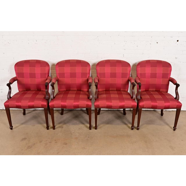 A gorgeous set of four English Regency or Louis XVI style armchairs or dining captain chairs By Baker Furniture USA, Circa...