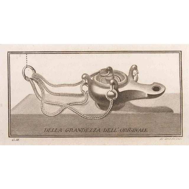 Oil lamp to hang is an etching realized by filippo de grado (1705-1780). The etching belongs to the print suite...