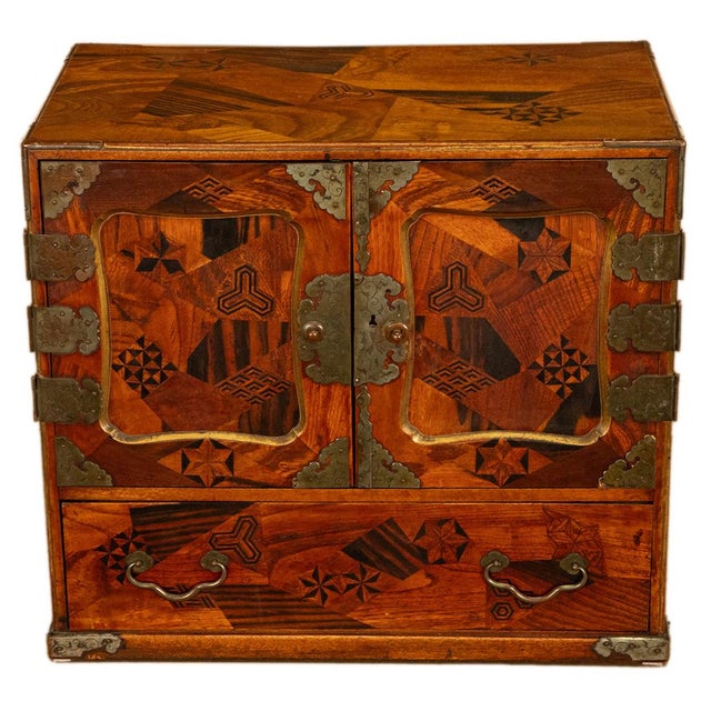 A fine antique Japanese marquetry and parquetry Meiji period Jewelry chest, table cabinet or Kodansu, circa 1880. The...
