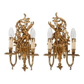 1950s Spanish Empire Cast Brass Winged Goddess Nike Victory 2-Light Wall Sconces - A Symmetrical Pair For Sale