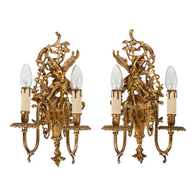 1950s Spanish Empire Cast Brass Winged Goddess Nike Victory 2-Light Wall Sconces - A Symmetrical Pair For Sale