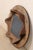This custom mirror has been creatively up-cycled with an old N. African wooden cooking utensil as the surround, with new...