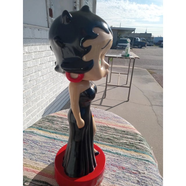 Betty Boop Bobblehead, created by King Features Syndicate Inc. in 1999, is a great addition to any collection of animation...