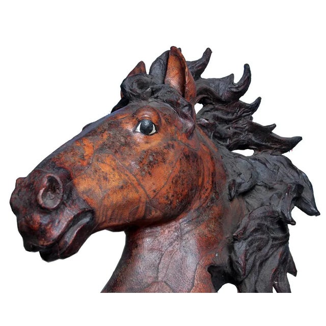 Add a striking and unique touch to your decor with this vintage horse bust sculpture made from fine leather. This large...