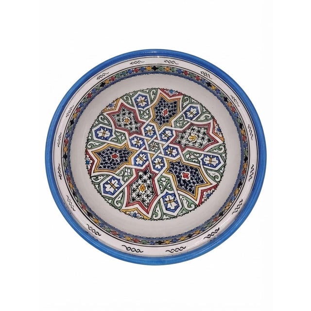 Classic Cobalt Blue and White Fes Ceramic Tagine with Arabesque Motifs Description: A timeless expression of Moroccan...