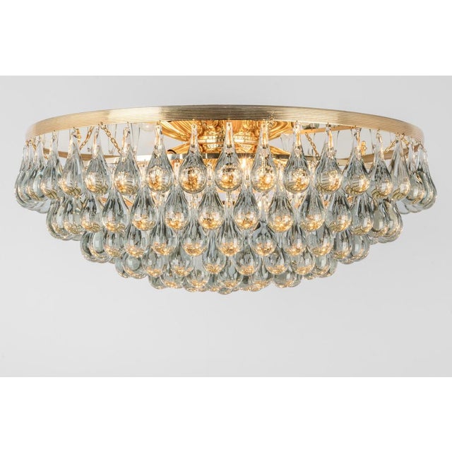 A stunning huge chandelier by christoph palme, germany, was manufactured in the 1970s. It’s composed of murano teardrop...