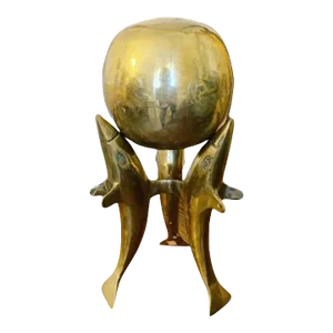 Mid-Century Brass Sphere on Sculptural Dolphin Stand