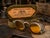 An authentic pair of early 20th-century Willson Service Goggles, Style E, presented with its original metal storage case....