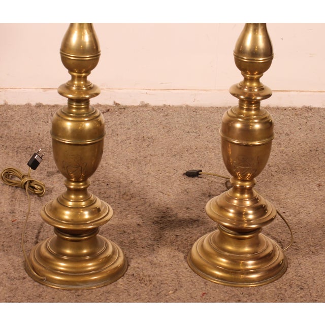 Superb pair of early 20th-century Italian Renaissance-style bronze floor lamps. This superb pair features magnificent...