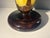 Beautiful decorative glass vase. Yellow with acid cut brown cameo overlay. Made around 1920s. Looks very elegant in any...