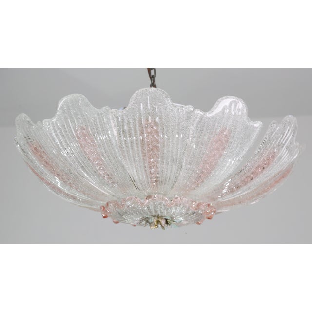 Gorgeous Murano glass ceiling lamp, perfect for decorating a large space in pink and transparent murano glass leaves The...