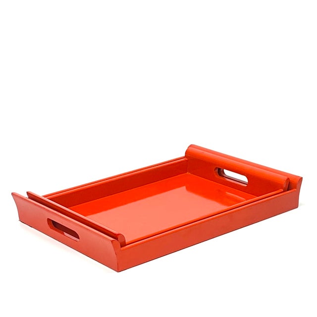 Red wooden trays, set of 2. This is a stunning set of red lacquer wooden trays from the mid-20th century. They are...