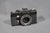 A very nice vintage East German 35mm camera set, centered around a Praktica LLC SLR camera body and accompanied by a...