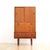 This fabulous mid century bar cabinet was manufactured by Turnidge of London during the 1960s. Produced in teak, this...