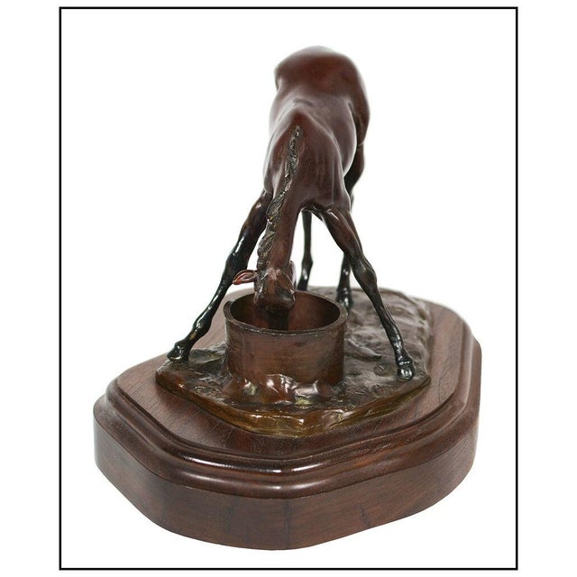 The artwork here, "Every Last Drop", is a wonderful depiction of a horse foal drinking from a bucket, that is saturated...