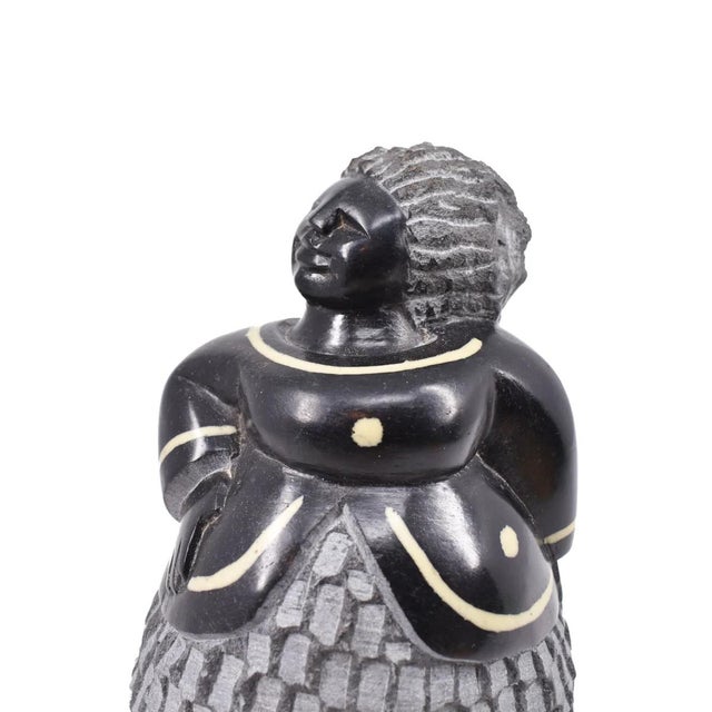 Shona sculpture, originating from Zimbabwe and named after its largest ethnic group, the Shona people, represents a fusion...