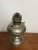 Antique Rayo center-draft kerosene oil lamp with nickel-plated metal body and ornate burner. Missing the fuel tank cap....