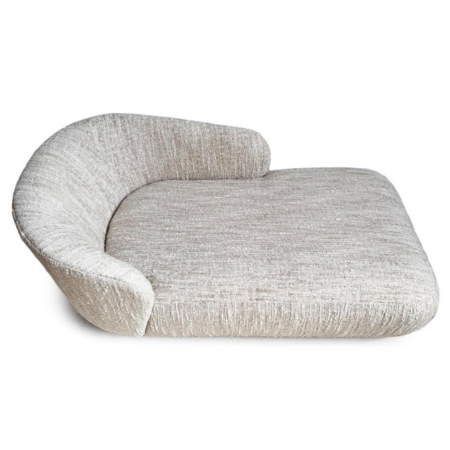 Contemporary light textured boucle upholstered chaise lounge. Elegant minimalist shape. Beautiful soft piece to freshen up...