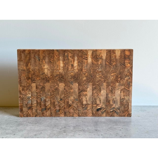 Our ambrosia maple end-grain chopping block is a durable and visually striking kitchen tool crafted from the end-grain of...