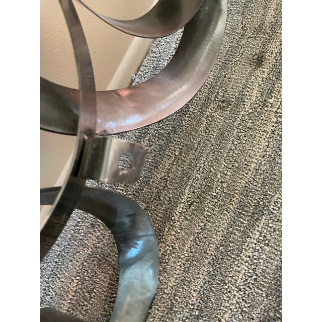 This is made by Curtis Jere/Artisan House, has original sticker. This has two tiny areas of rust that is typical of these....