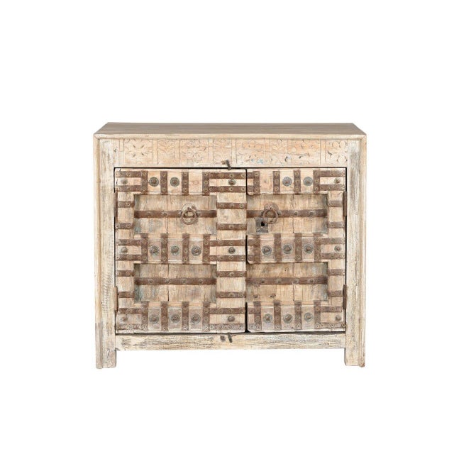 This Cabinet/Buffet has been handcrafted from antique Indian carved door panels and reclaimed wood. The front features...