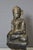 Black lacquered wooden Buddha with traces of gilding, depicted seated in the lotus position, origin Burma or Laos, 19th...