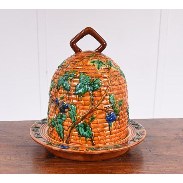 Fine English majolica cheese dish and cover by Minton, modelled in the form of a traditional beehive Circa Date 1860 The...