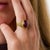 This striking Retro pink tourmaline ring is a beautifully expressive jewel from the 1940’s, centered by a cabochon cut...