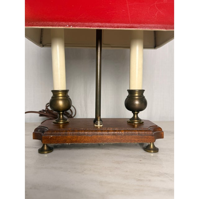 This Vintage 2-Light French Bouillotte Style Table Lamp with Red Shade, Antique Brass & Wood Desk Lamp is in good...