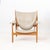 Finn Juhl (Danish, 1912-1989) "Chieftain" Lounge Chair, walnut frame and tan leather upholstery, with "One Collection /...